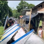 Porsyon sang pader sang Municipal Health Office and Birthing Clinic sa Estancia natumba tungod sang pagbaha sa sige-sige nga pag-ulan dala sang Bagyo Ramil